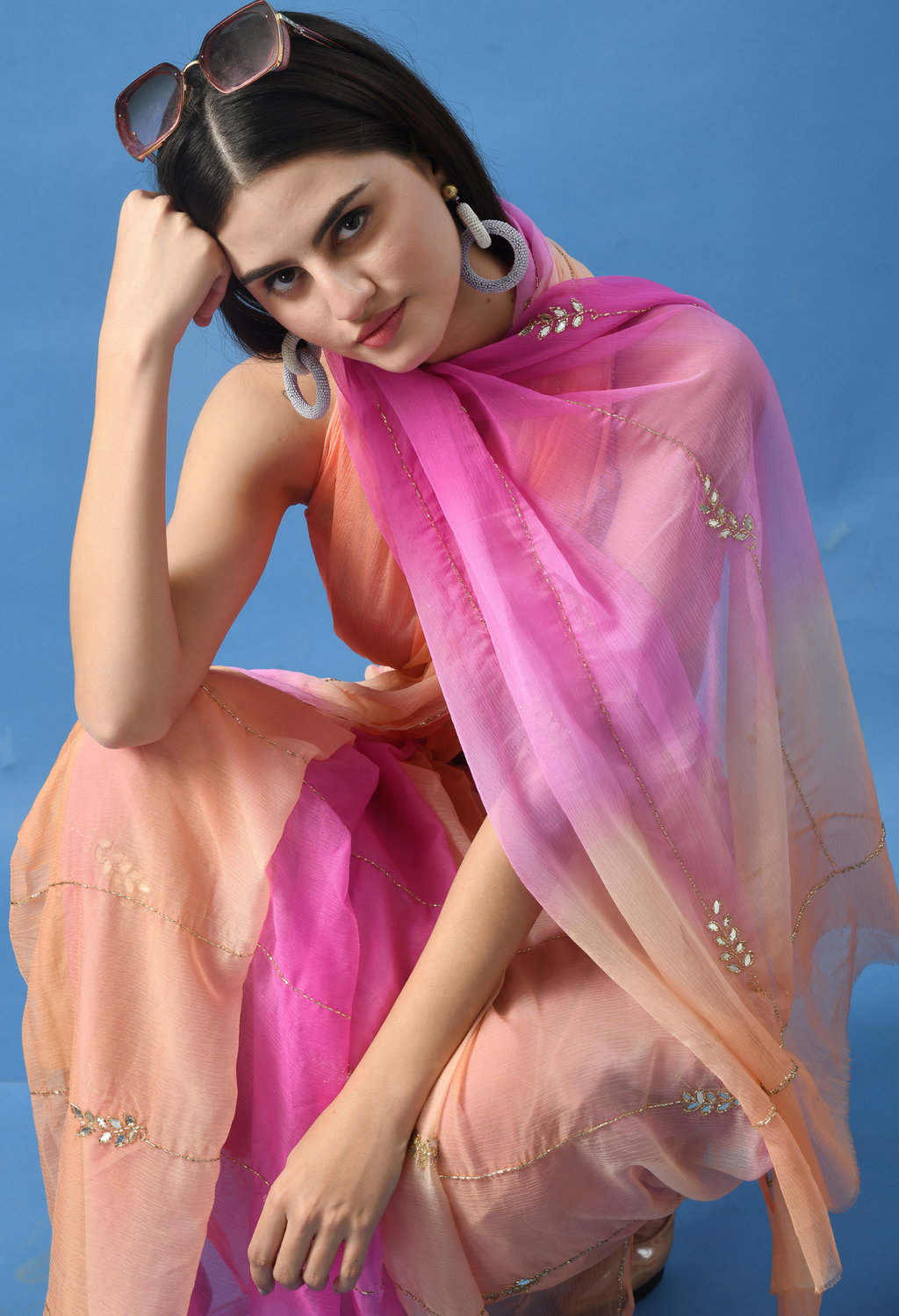 Peachy Pink Embellished chiffon saree styled as festive wear, daily wear saree, and party wear saree, a versatile trousseau saree for weddings.