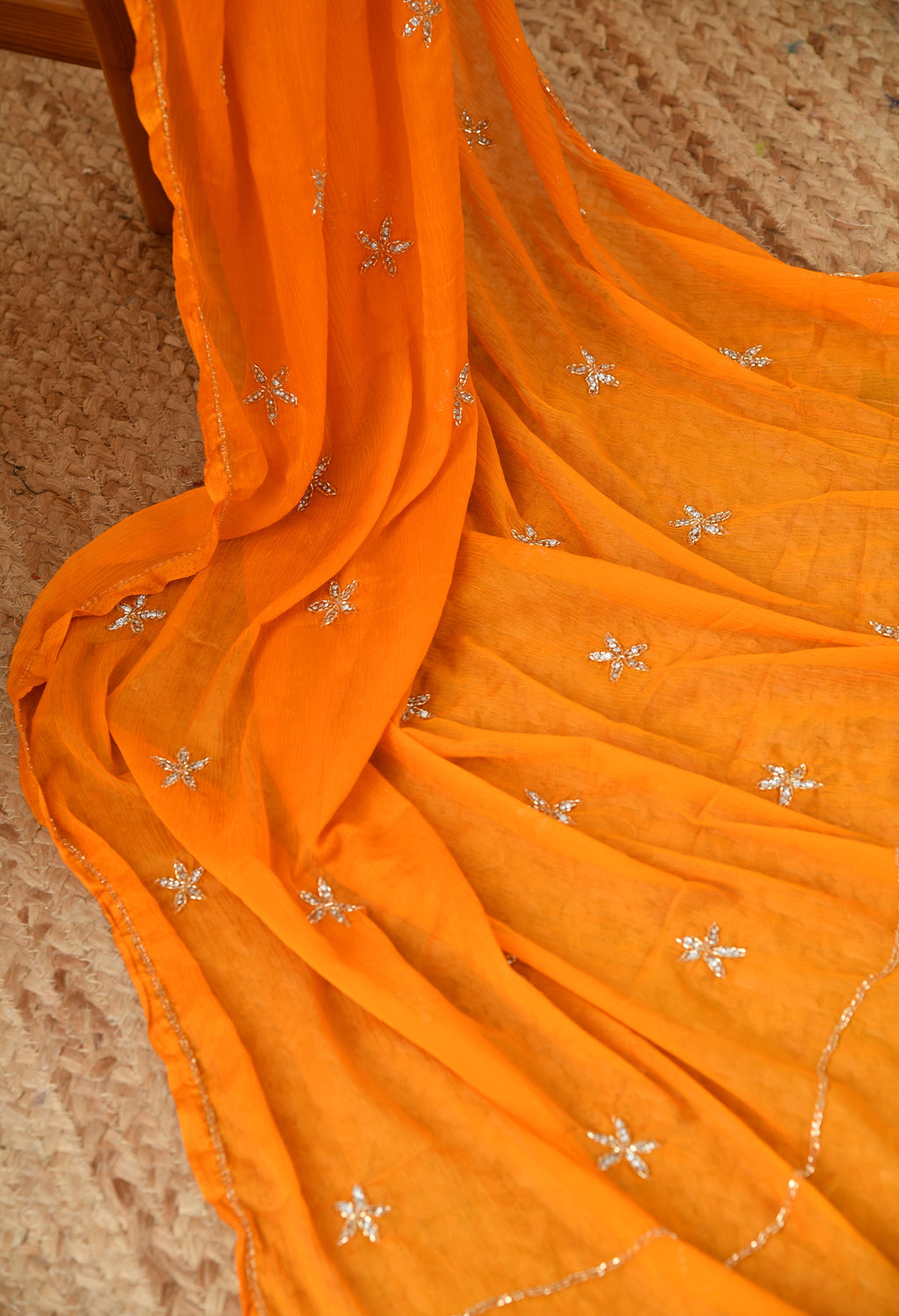 Dutch Orange Embellished chiffon saree for festive wear, trousseau saree, suitable for farewell saree, daily wear saree, party wear saree looks.