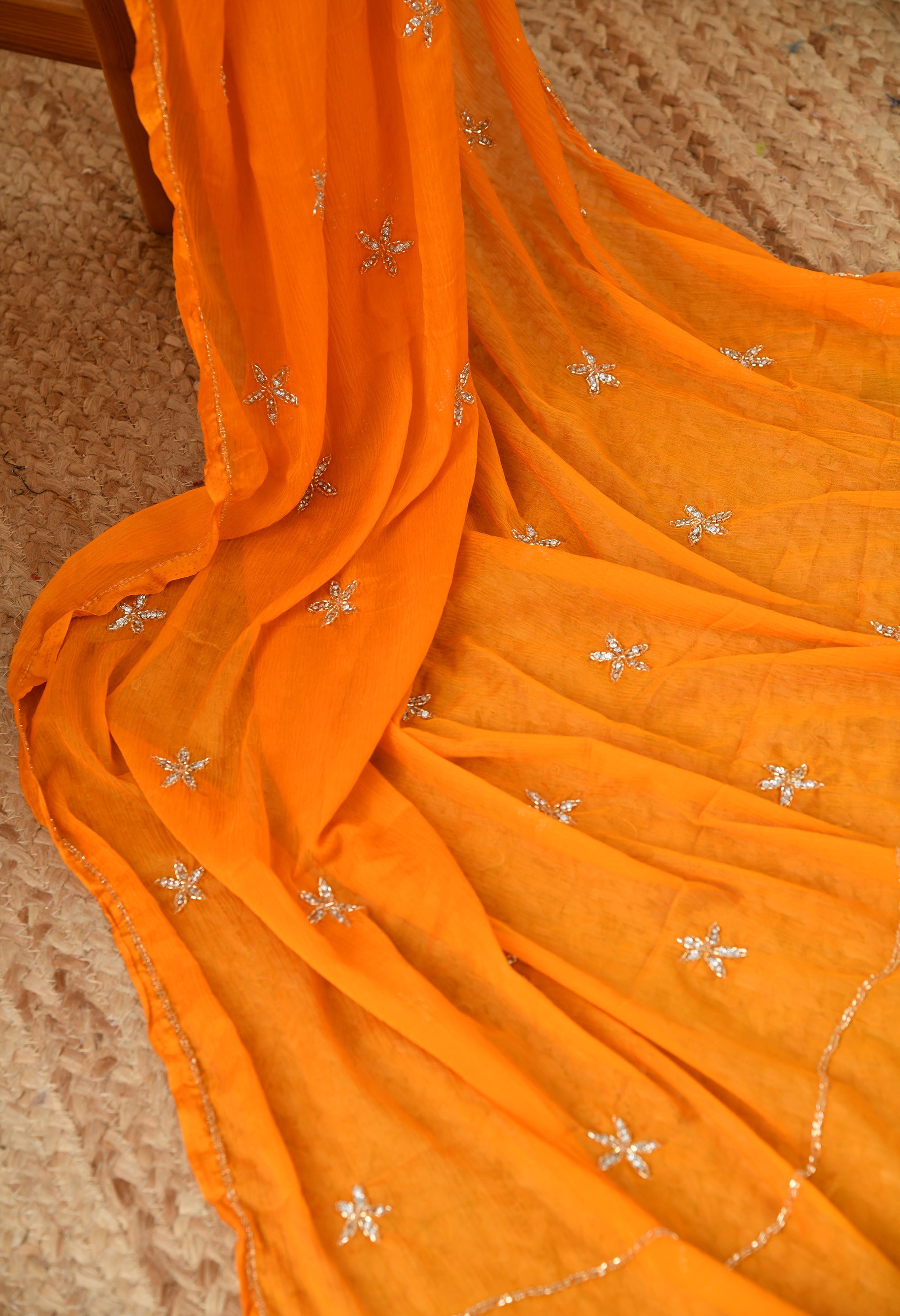 Dutch Orange Embellished chiffon saree for festive wear, trousseau saree, suitable for farewell saree, daily wear saree, party wear saree looks.