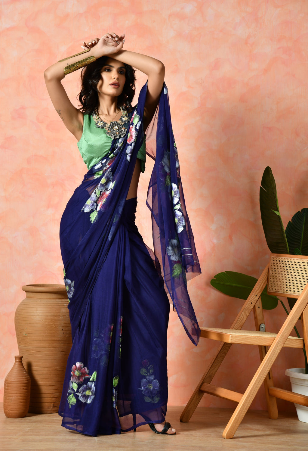 Navy Blue Traditional leheriya saree in chiffon fabric, blending festive wear charm with trousseau saree elegance for occasions.