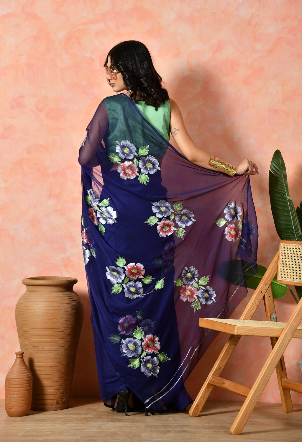 Vibrant chiffon saree styled as a casual saree yet versatile enough for party wear saree or farewell saree moments.