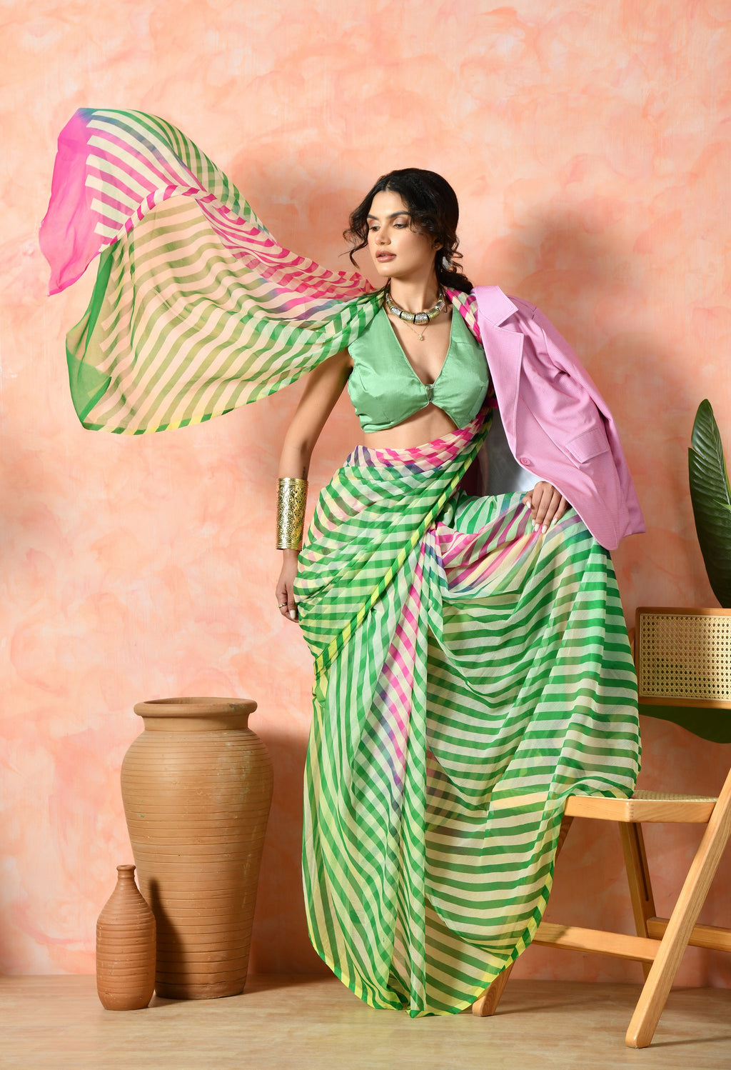 Elegant chiffon green pink saree styled for festive wear, perfect as party wear saree, farewell saree, graceful pre-wedding collection look.