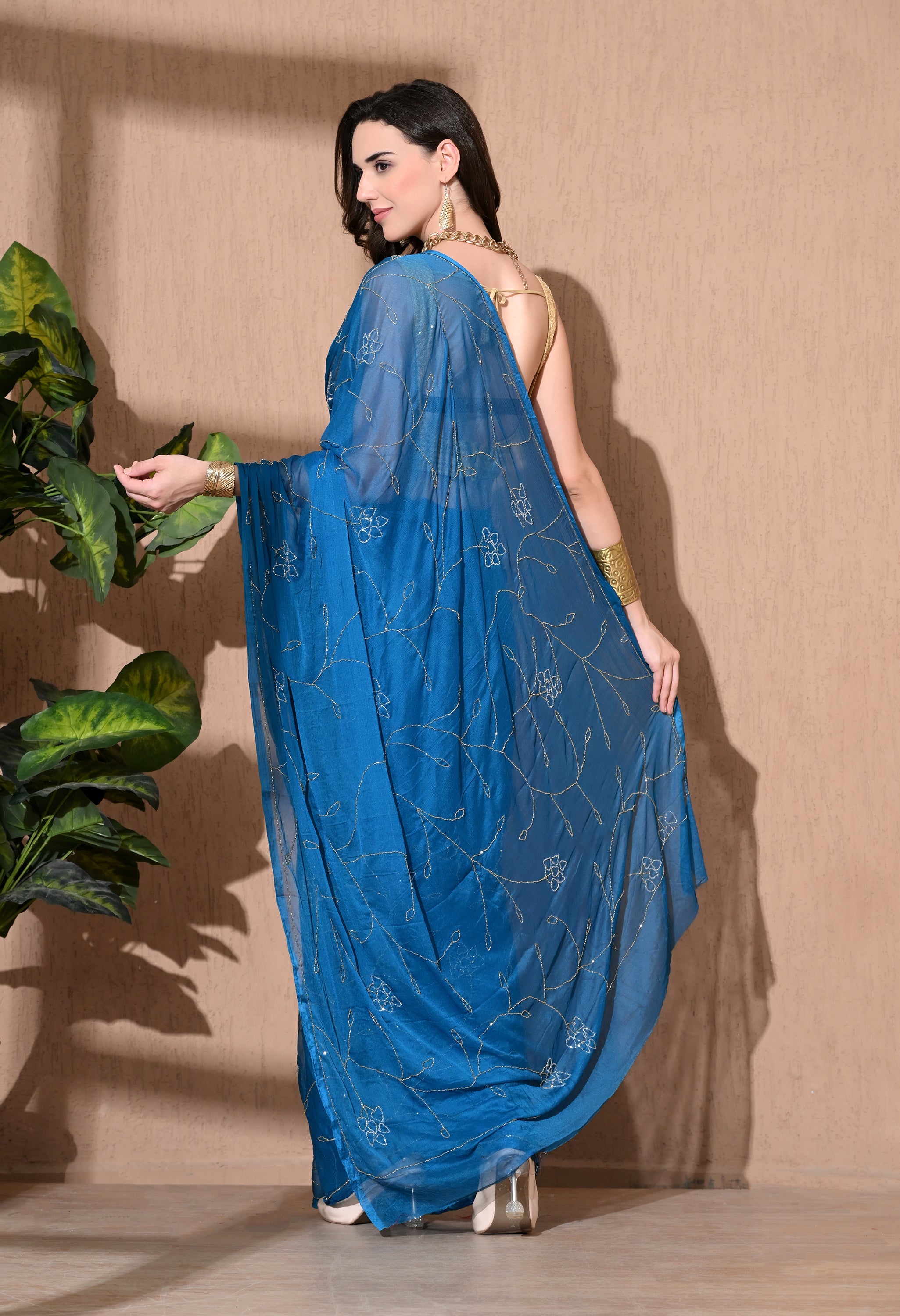 Sophisticated chiffon saree designed for festive wear, pre-wedding collection, versatile as party wear saree and trousseau saree.