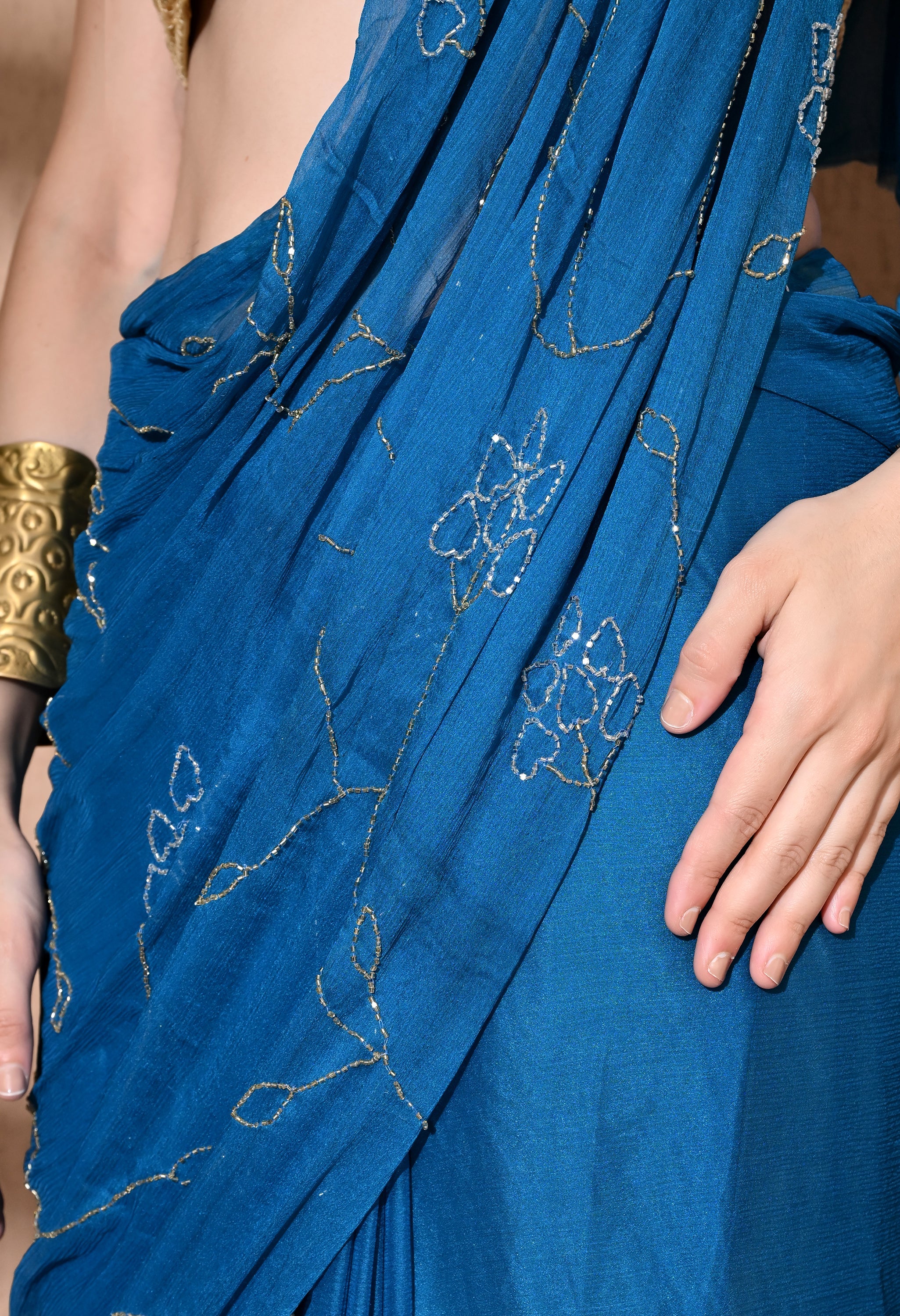 Sophisticated chiffon saree designed for festive wear, pre-wedding collection, versatile as party wear saree and trousseau saree.